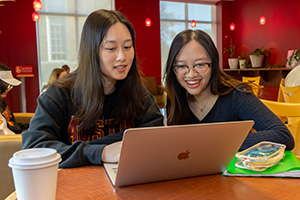 two female students studying